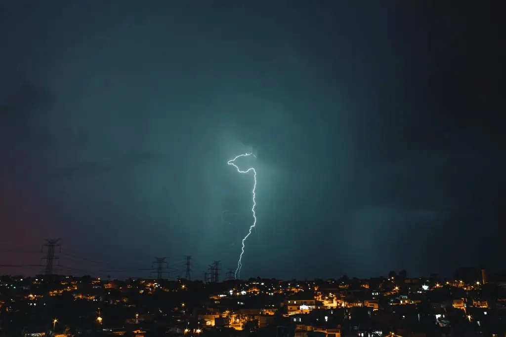 Dramatic lightning strike over the night sky during a storm